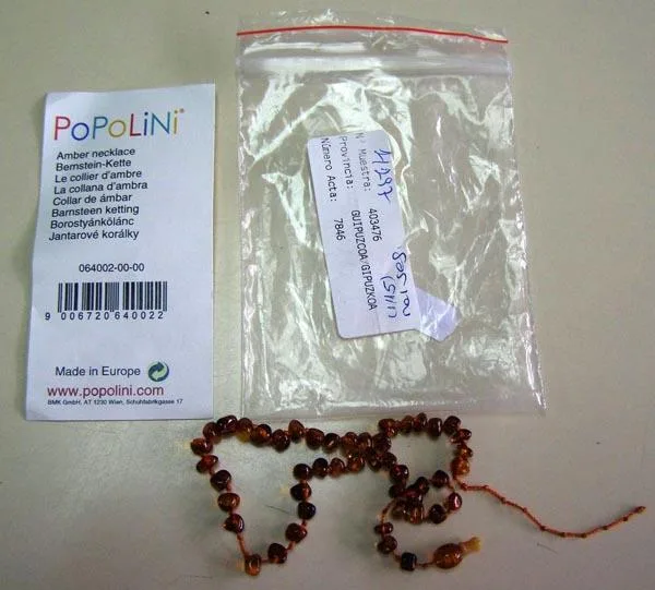 Collana di dentizione ambrata «Amber Necklace» (Popolini)