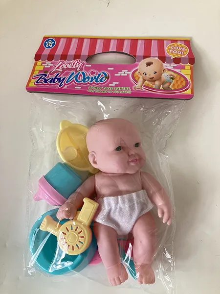 Bambola di plastica «Babydocka 27 cm med tillbehör»