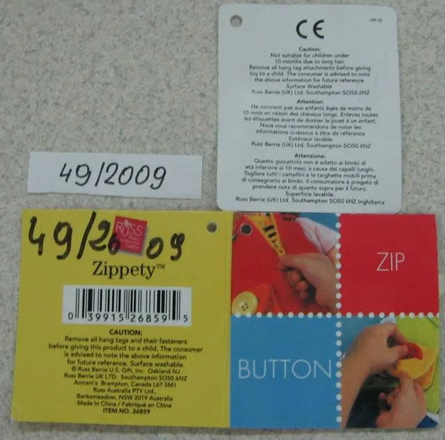 Bambola – Russ – Pulsante zip (Zippety)