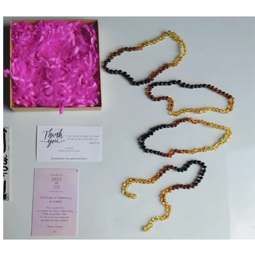 Collana dentizione «Collier enfant ambre balte enfants enfants, couleur arc-en-ciel perles baroques noué» — foto 1 dell'alert A12/03125/24
