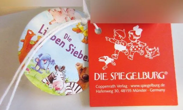 Giocattolo musicale in legno (castaneti) «Die Lieben Sieben» (Die Spiegelburg)