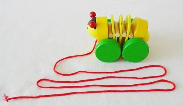 Giocattolo pull-along «Drevene tahacie hracky - Husenica» (Unknown)