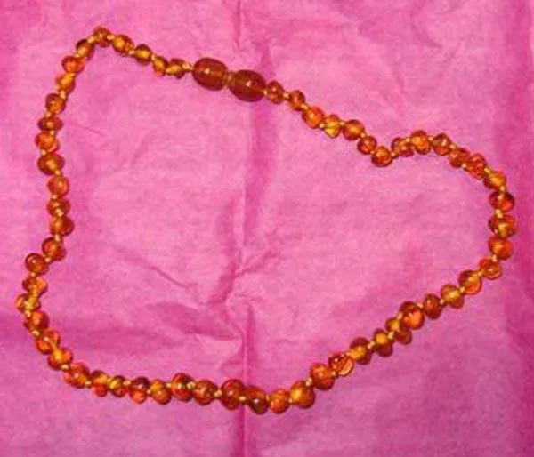 Gioielli ambrati per bambini (Auris)