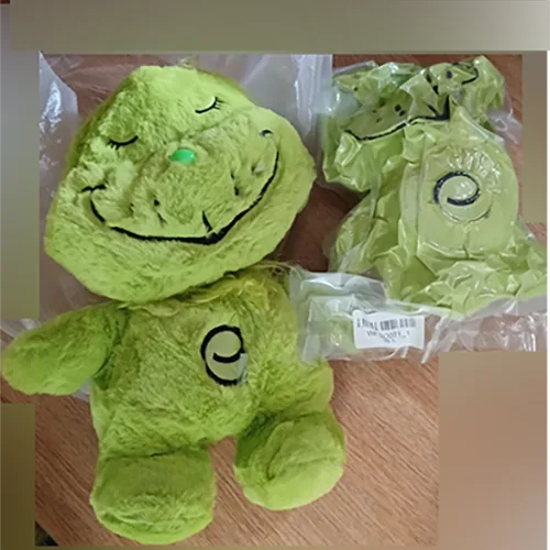Green Grinch-like Plush Toy