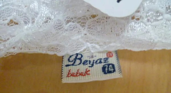 Abbigliamento per bambini «Güpürlü Çıtçıtli Badi» — foto 2 dell'alert A12/1108/18