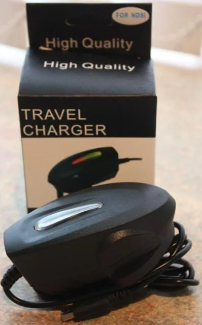 Caricabatterie «High Quality Travel Charger» — foto 1 dell'alert A12/0746/13