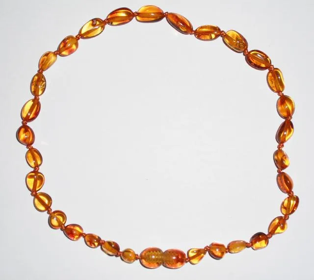 Collana di dentizione ambra e bracciale «Honey Bean» — foto 3 dell'alert A12/0354/13