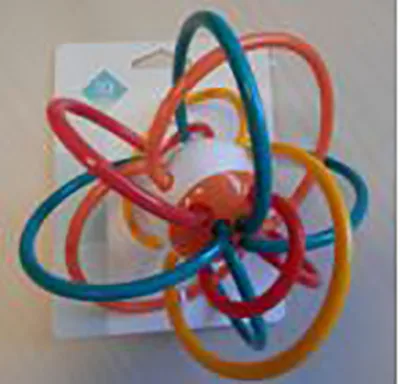 Sonaglio giocattolo «Jouet araignée multicolore» (TEX BABY)