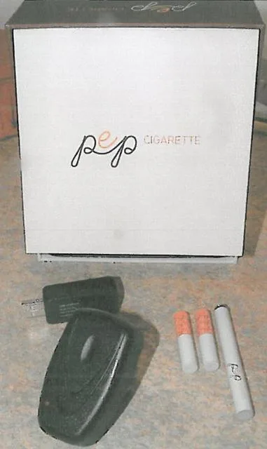 Kit sigaretta elettronica con caricabatterie da viaggio & #13; & #13; — foto 1 dell'alert 0098/11