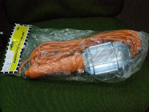 Lampade portatili – 1. con griglia metallica e cavo di prolunga di 10 metri, 2. con griglia metallica e cavo di prolunga di 5 metri — foto 1 dell'alert 0250/08