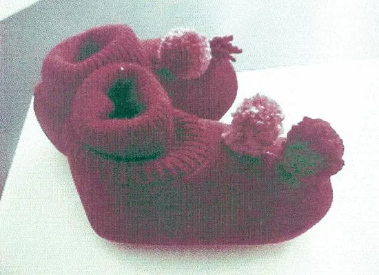 Le scarpe da bambino. (BEBE COQUIN.)