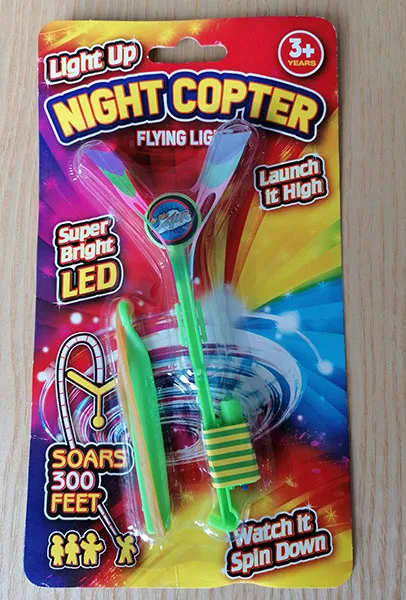 Giocattolo di plastica con LED «Light Up Night Copter Flying Light» (Pms)
