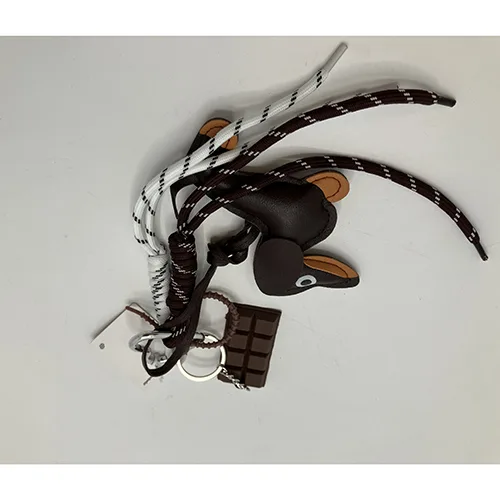 Portachiavi «Mobile charm dog with chocolate and laces» (Mobello)