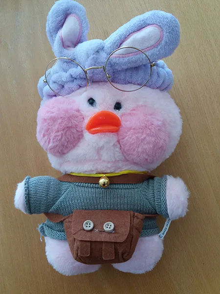Giocattolo morbido «Pink plush stuffed toy duck with puffy pink cheeks „Lalafanfan“» (Lalafanfan)