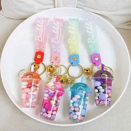 Portachiavi «Porte-clés en forme de tasse de thé aux perles de tapioca fluorescent en acrylique pour …» — foto 4 dell'alert SR/02328/25