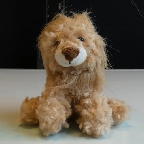 Giocattolo morbido con portachiavi «Porte-clés lion en peluche» (Abricot Lamb)