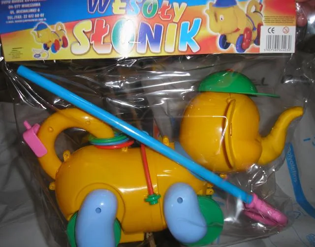 Premere il giocattolo "Wesoły Słonik" [Merry Elephant] &amp;#13; (PUPH Marek Kutolowski)