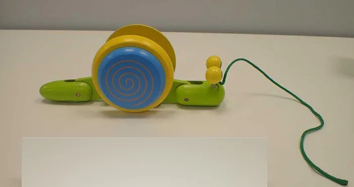 Disegnare giocattolo (trekspeelgoed) «Pull snail» (Playwood)