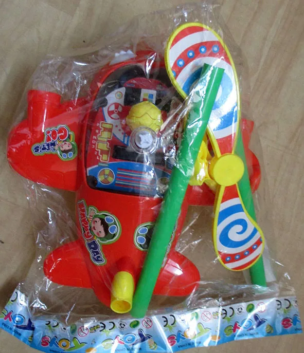 Giocattolo push-along «Samolot Pchacz» (TOYS GROUP)
