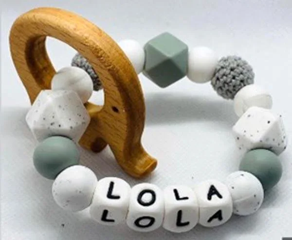 Anello di dentizione «Silicone bead with Wooden teething ring» (Calbabyco)