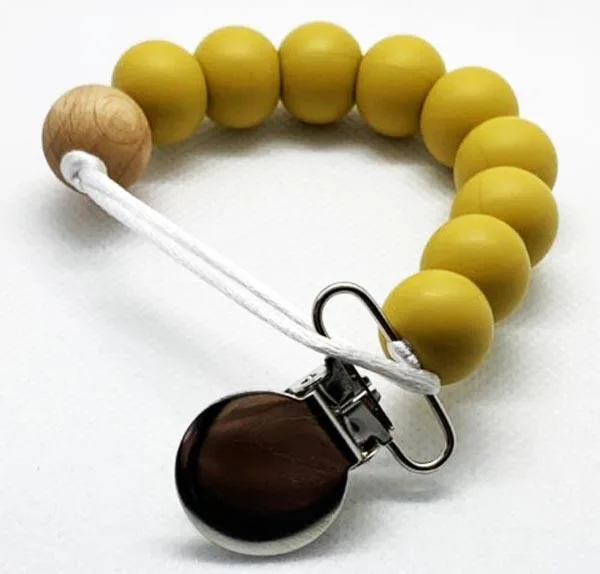 Anello di dentizione «Silicone bead with Wooden teething ring» — foto 3 dell'alert A12/1106/19
