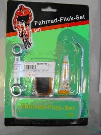 Soluzione in gomma in set di riparazione bici contenente soluzione di gomma, chiave e diversi intonaci, set "Fahrrad Flick" — foto 1 dell'alert 0882/06