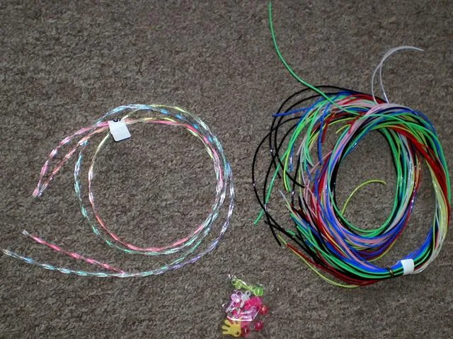 Stringhe di plastica "giocattoli intrecciati" &amp; #13; &amp; #13; (INTERWOVEN TOYS)