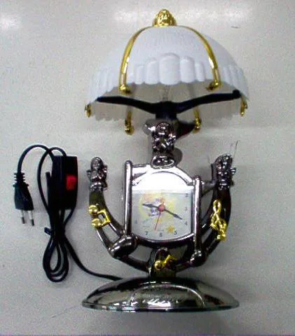 Lampada da tavolo. «Table lamp with build-in clock.» — foto 1 dell'alert 0700/07