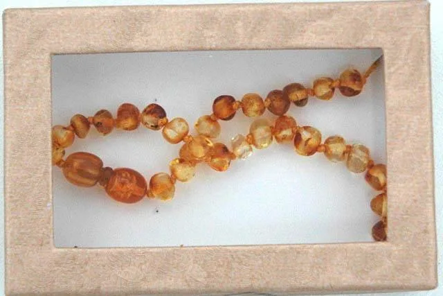 Collana di dentizione ambra «Unknown» (Babymoments)