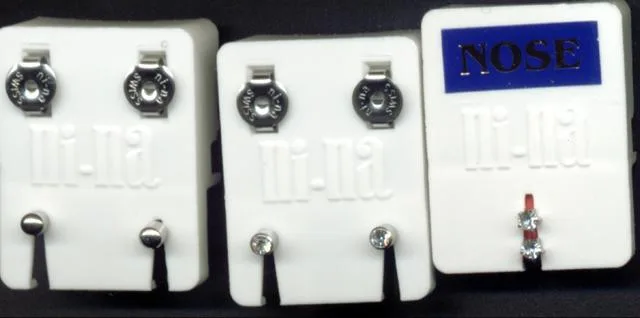 Orecchini e naso piercing &amp; #13; &amp; #13; «“White Mini Ball”, “White Mini Crystal” And “White Mini Star With Crystal”» (Ni-Na)