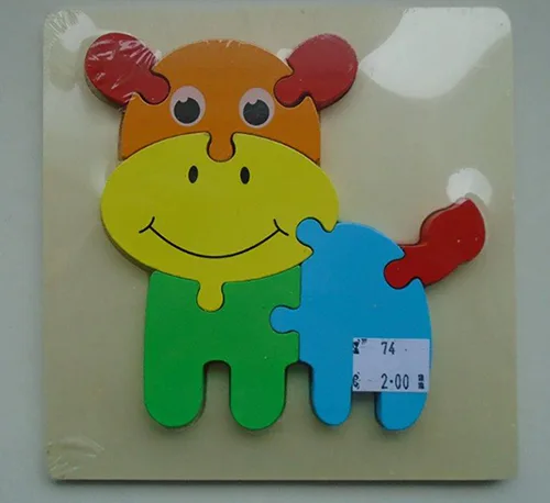 Giocattolo di legno «Wooden puzzle - Cow»