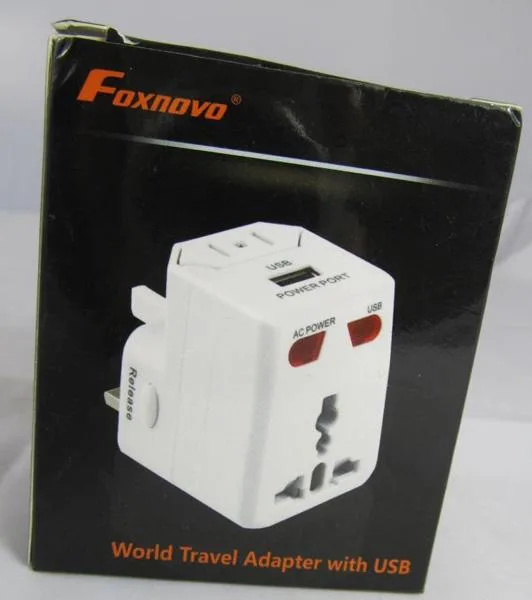 Adattatore per spina da viaggio «World Travel Adapter with USB» (FOXNOVO)