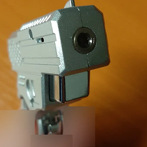 Accendino di novità «Zapalovač neobvyklého tvaru pistolka»